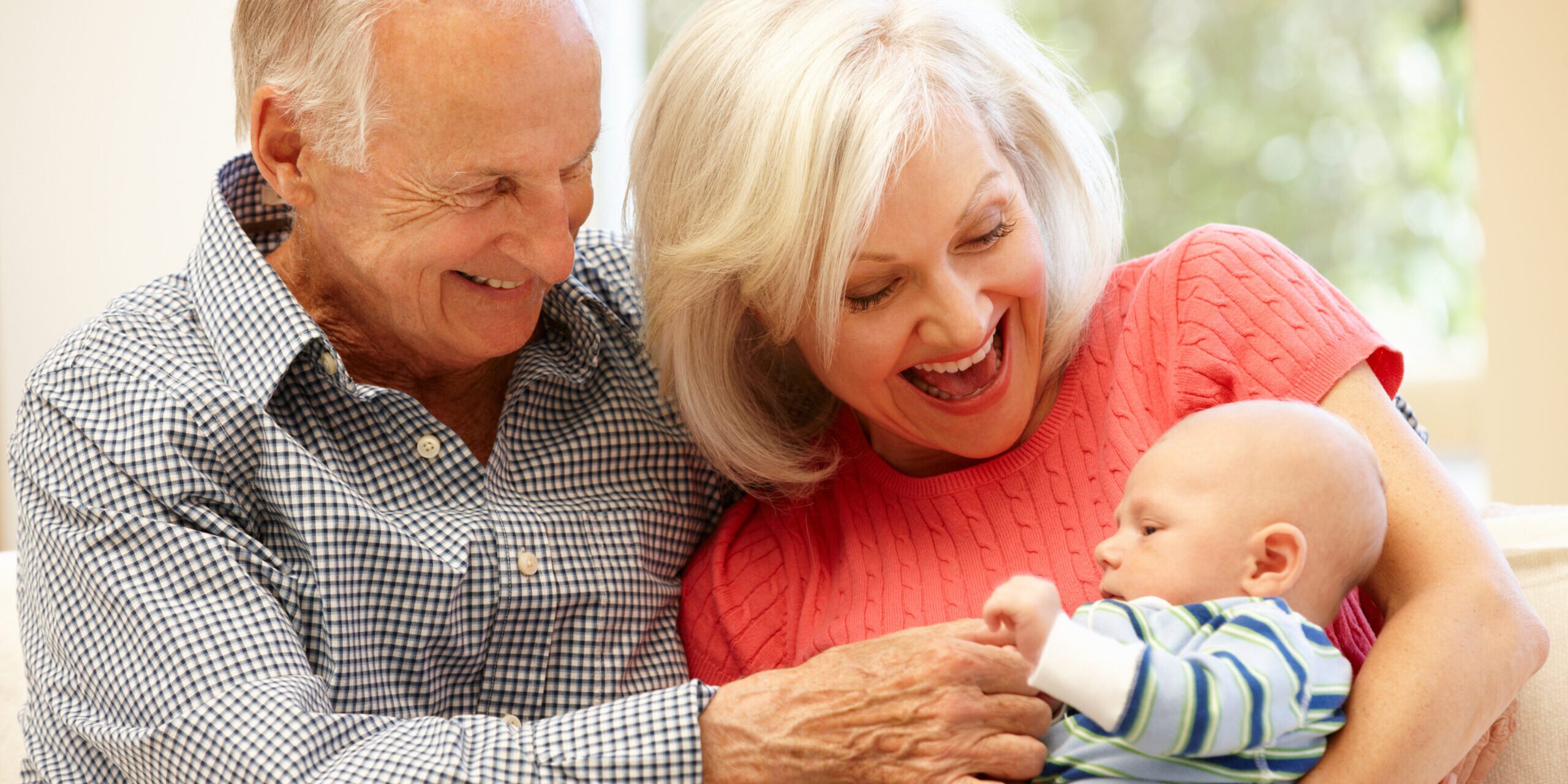 Senior couple with baby grandson